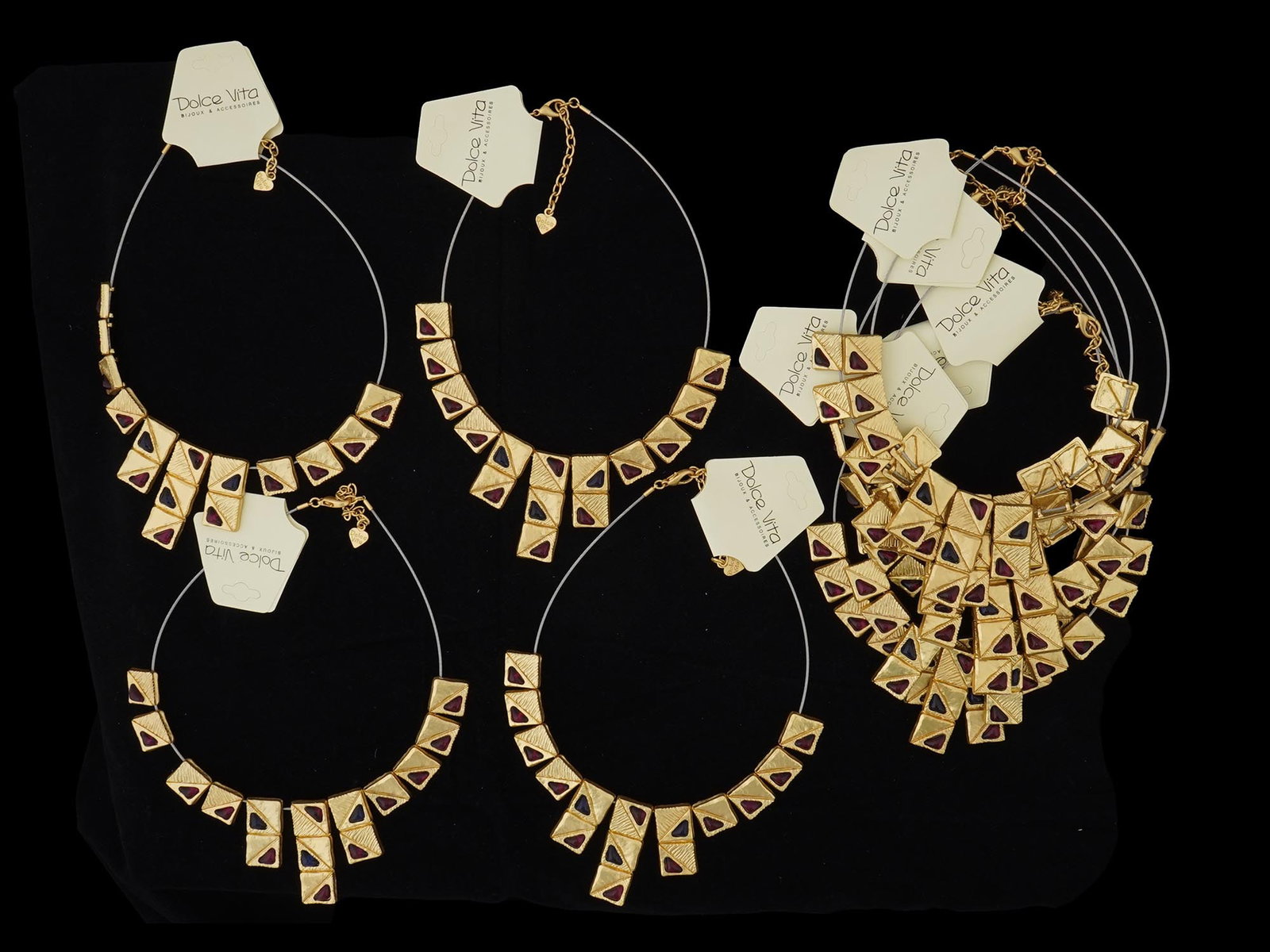LOT OF 10 FRENCH DOLCE VITA COSTUME JEWELRY NECKLACES: A collection of ten French Dolce Vita Paris costume jewelry necklaces. Each ware is made in the Art Deco geometrical design featuring rectangular shaped links. Each is marked with an impressed stamp, 