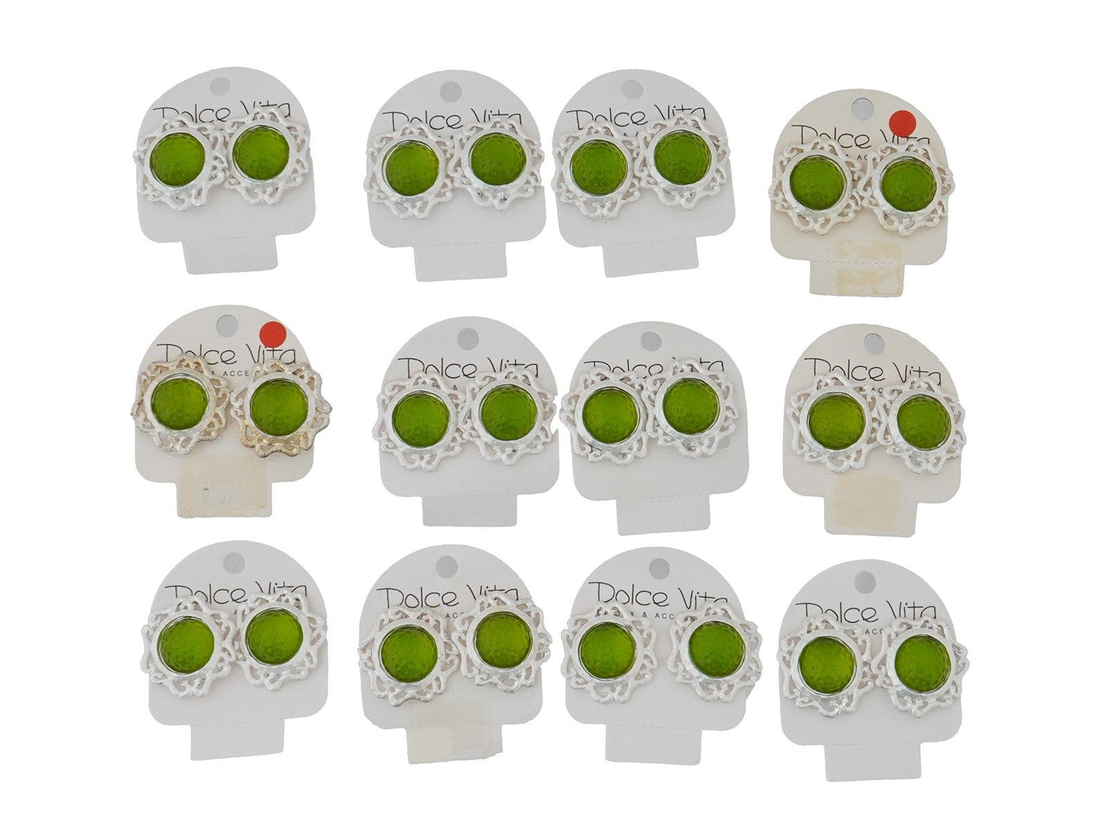 LOT OF 12 FRENCH DOLCE VITA COSTUME JEWELRY EARRINGS: A collection of twelve pairs of French Dolce Vita Paris costume jewelry clip earrings. Each ware is made in the Art Nouveau manner and decorated with a green faux gemstone. Each is mounted on a paper 