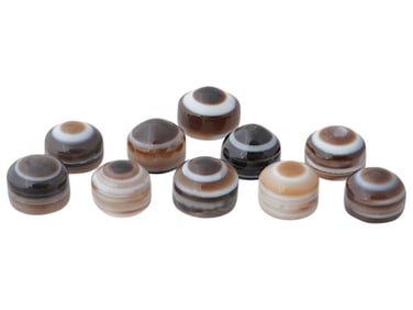 COLLECTION OF TIBETAN CARVED SHEEP EYE DZI BEADS