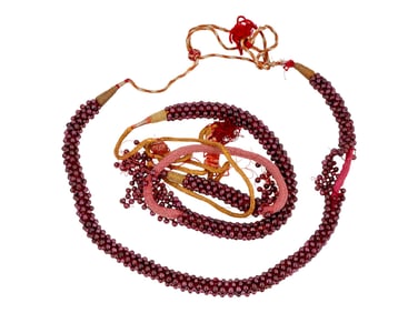 TWO NECKLACES COMPOSED OF RUBY STONE BEADS