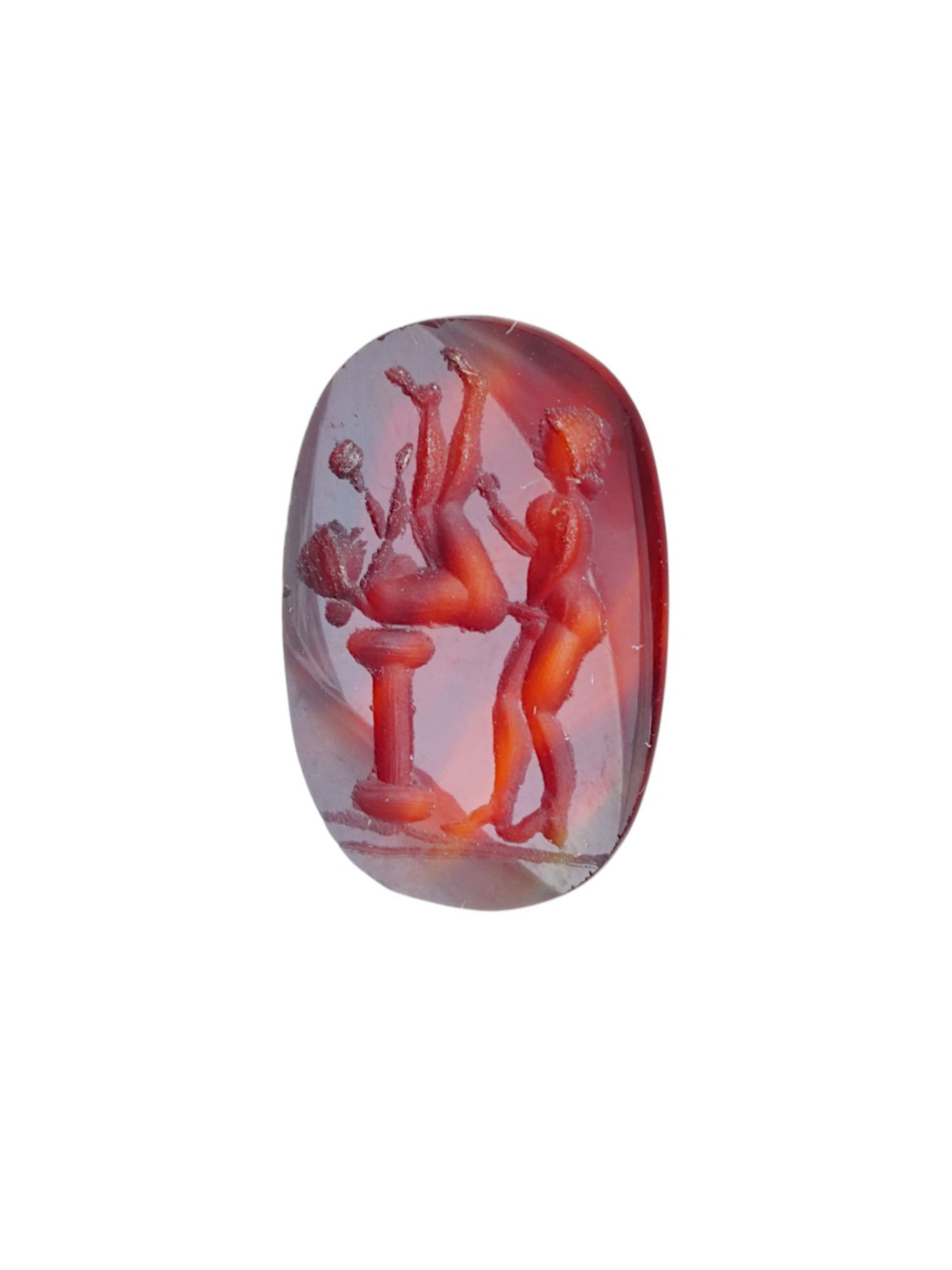 ANTIQUE CARVED CARNELIAN INTAGLIO SEAL W EROTIC SCENE: An antique carved carnelian stone intaglio featuring a detailed erotic scene in an ancient manner. Such intaglios were used as personal seals, amulets, or decorative jewelry, showcasing the Romans app