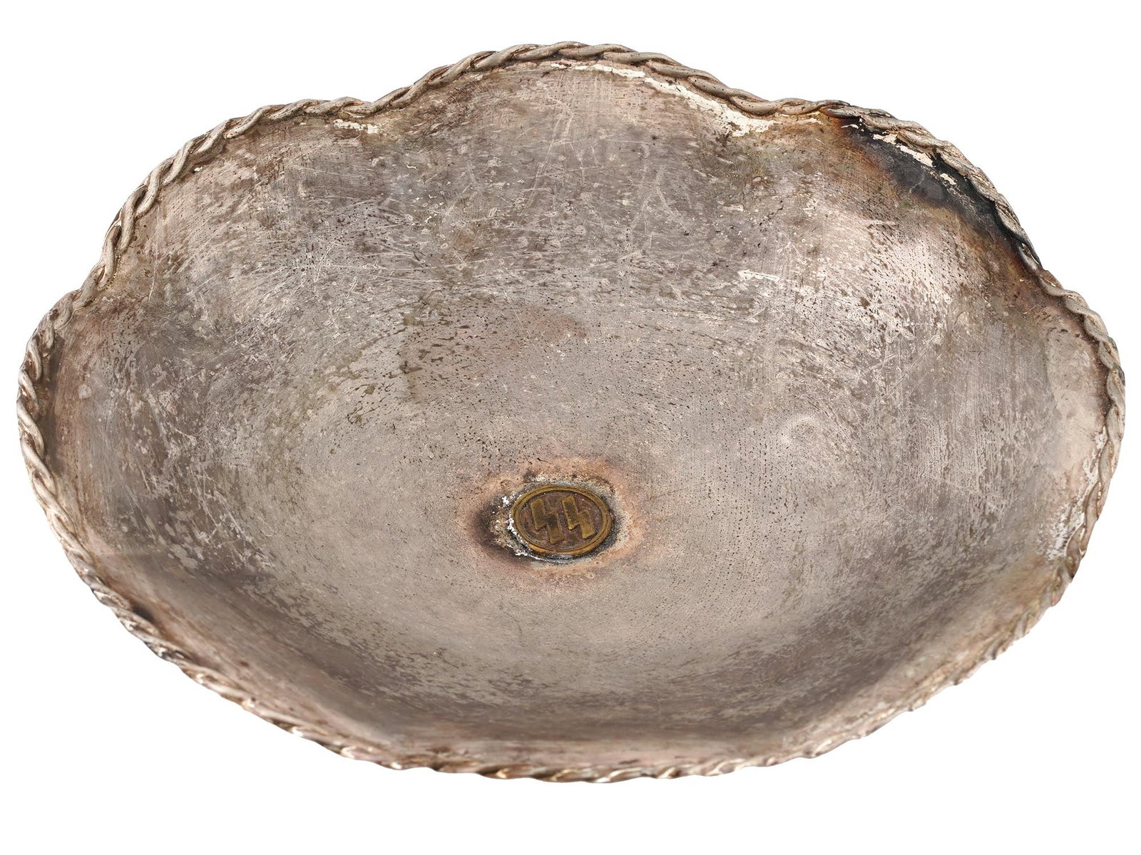 WWII MODEL NAZI GERMAN SS ZINC SERVING DISH: A WWII type Nazi German zinc serving dish. Round plate on three globe feet. Figurative rim of twisted wire design. Gilt overlay SS Runes in the center. Unmarked. Second World War Historical Collectibl