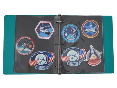 COLLECTION OF NASA SPACE RELATED STICKERS IN FOLIO