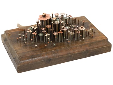 ABSTRACT SCULPTURE OF PAINTED NAILS ON WOOD BASE