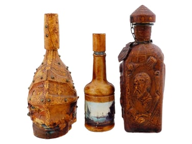 LOT OF DESIGNER BOTTLES IN LEATHER COVERS AND PRINT