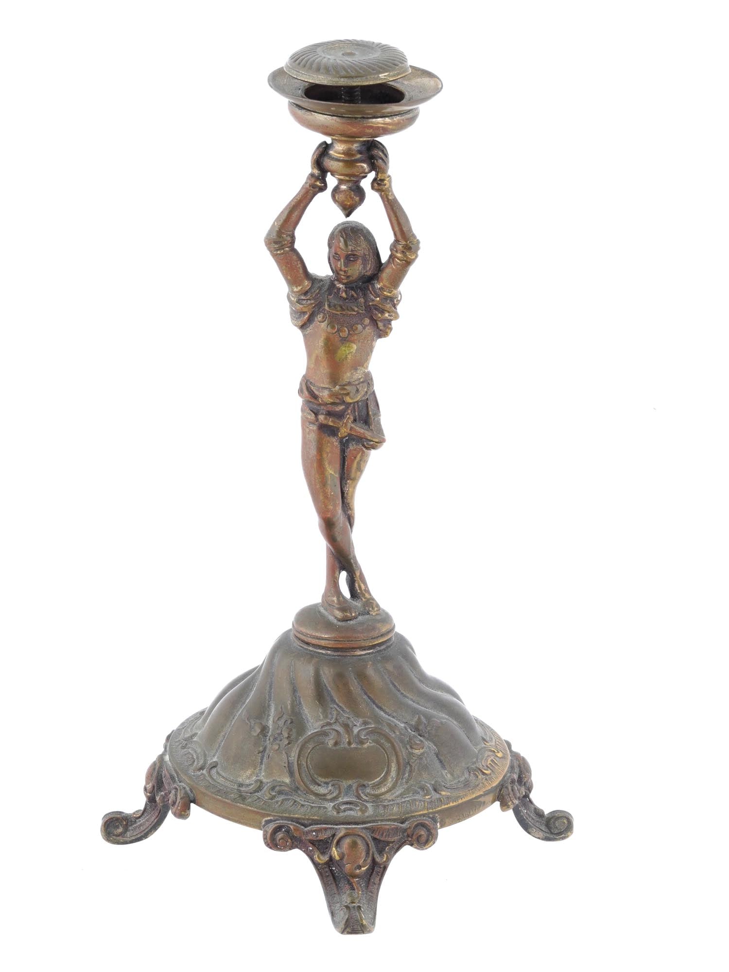 ANTIQUE BRASS CENTERPIECE PEDESTAL WITH A HUMAN FIGURE: An antique brass pedestal designed to serve as a centerpiece. Features a male figure dressed in medieval attire, complete with a dagger. The figures two hands hold up the top platform. The pedestal st