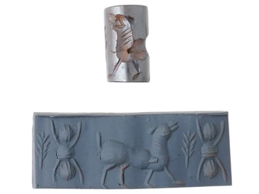 AN ANCIENT SUMERIAN CARVED STONE CYLINDER SEAL BEAD