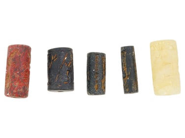 COLLECTION OF CYLINDER FORM CARVED STONE SEALS