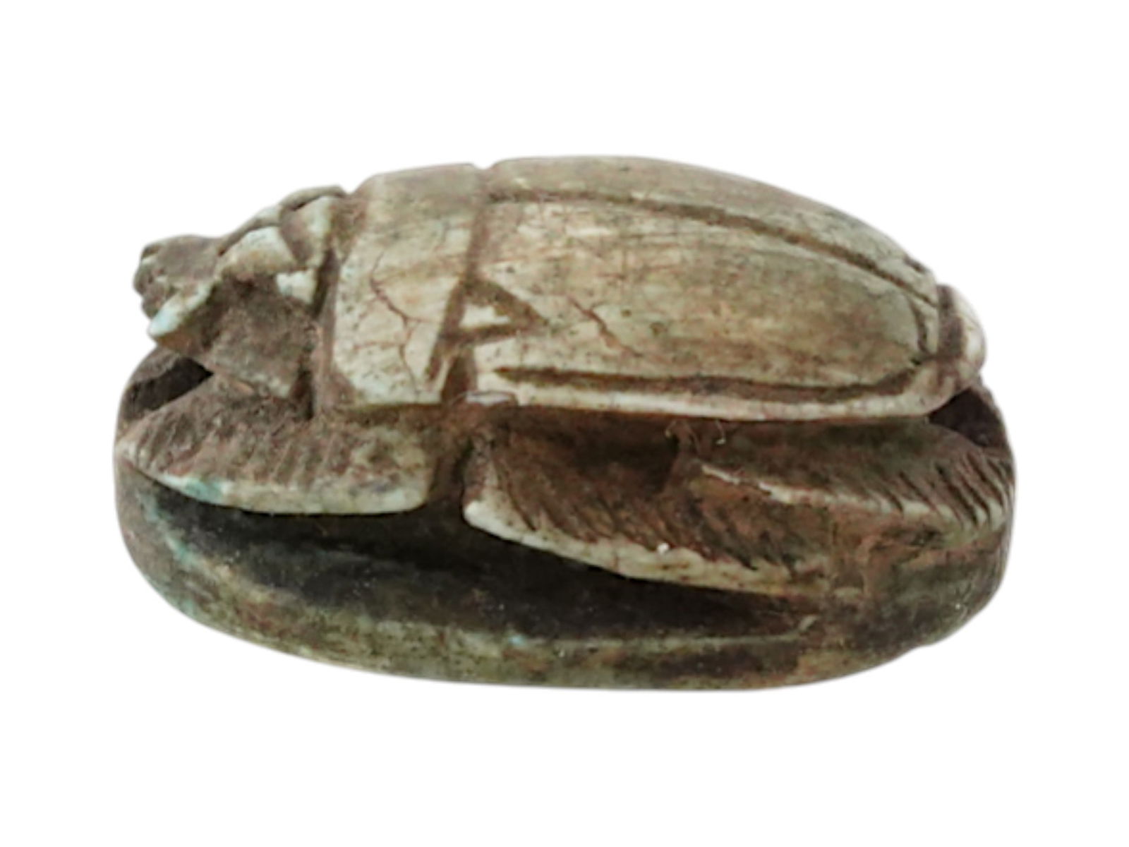 ANCIENT EGYPTIAN 18TH DYNASTY CARVED LIMESTONE SCARAB: An ancient Egyptian 18th Dynasty finely hand carved limestone scarab, the ancient Egyptian symbol of resurrection. The scarab is adorned with incised hieroglyphics calligraphy including a cartouche on