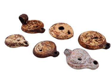 GROUP OF SIX ANCIENT TERRACOTTA OIL LAMPS