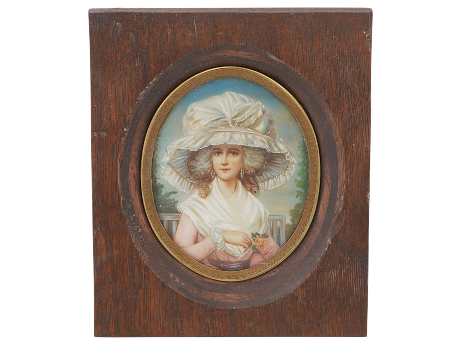AFTER GEORGE ROMNEY PORTRAIT MINIATURE PAINTING: After George Romney, English, 1734 to 1802, miniature painting on porcelain plaque. Portrait of a young woman in bonnet. Oval format. Unsigned. Framed. George Romney was the most fashionable British a