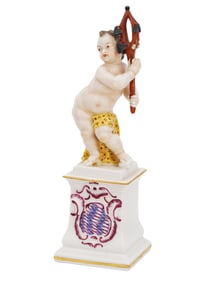 ANTIQUE NYMPHENBURG PORCELAIN PUTTO FIGURINE