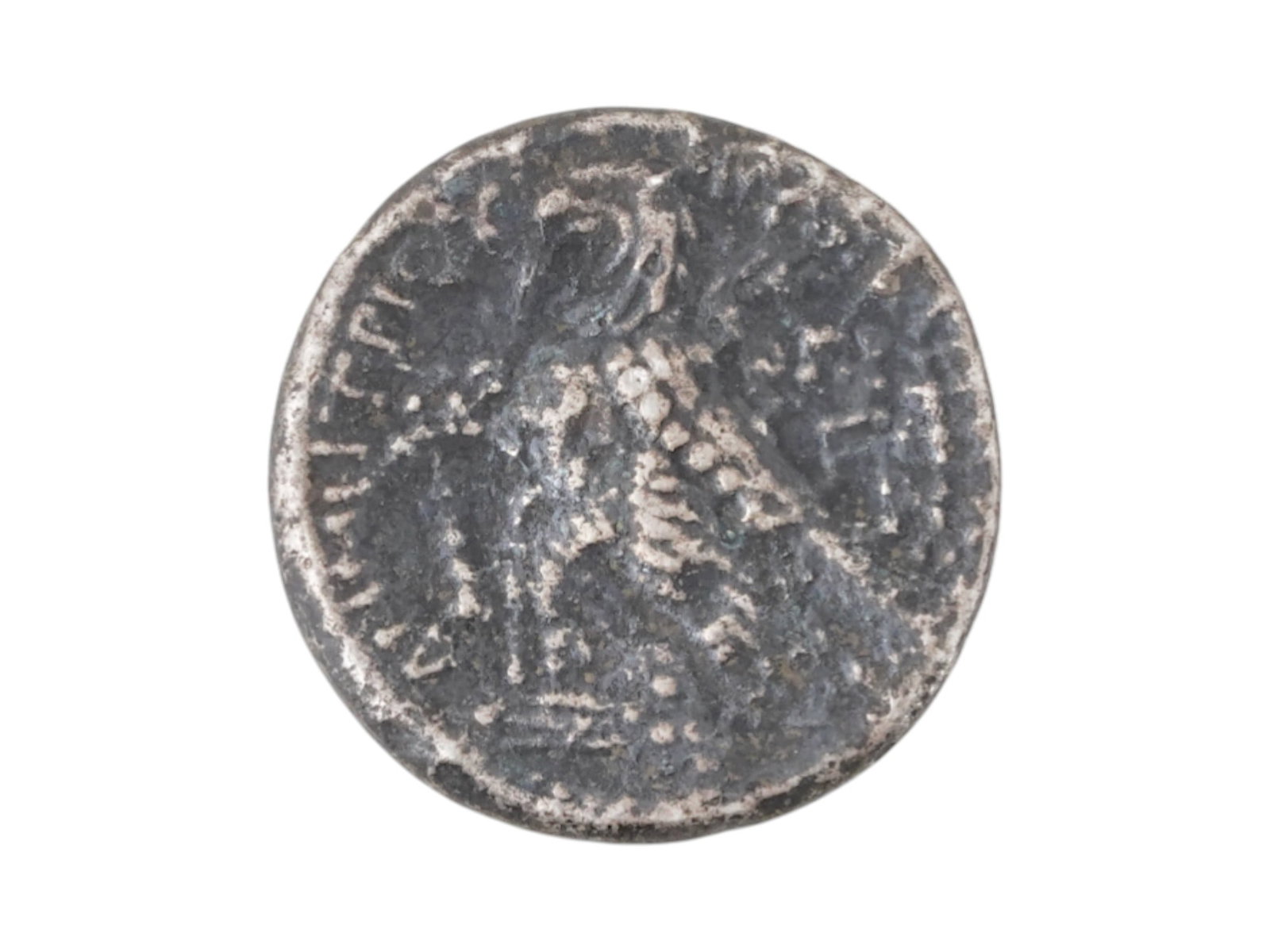 ANCIENT GREEK SELEUKOS VI SILVER TETRADRACHM COIN: An ancient Greek Seleukos VI, Epiphanies Nikator silver tetradrachm coin, the oldest son of Antiochos VIII. The obverse depicts the portrait of the ruler to the right. The reverse depicts an eagle, th