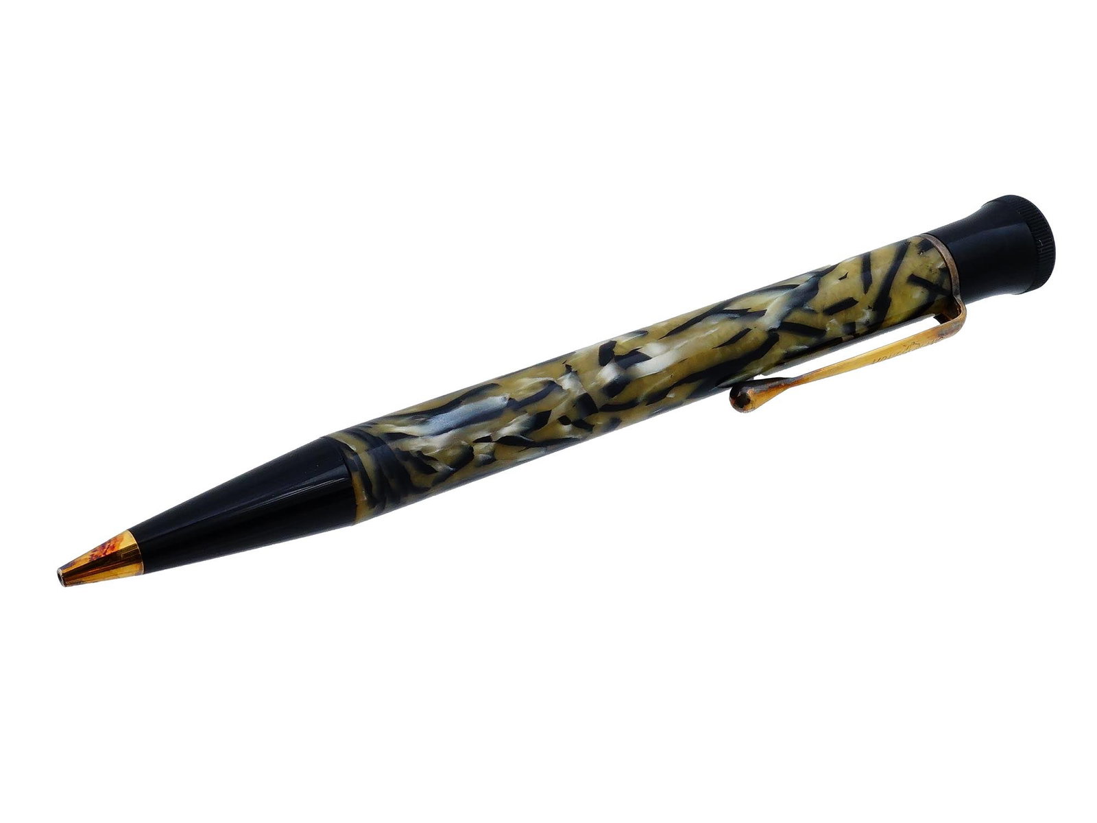 MONTBLANC WRITERS EDITION BALLPOINT PEN OSCAR WILDE: A vintage Montblanc Writers Edition ballpoint pen honoring Oscar Wilde, crafted in black and tan resin with gold-plated accents. The marbled resin body reflects Wildes style, while the clip and fittin