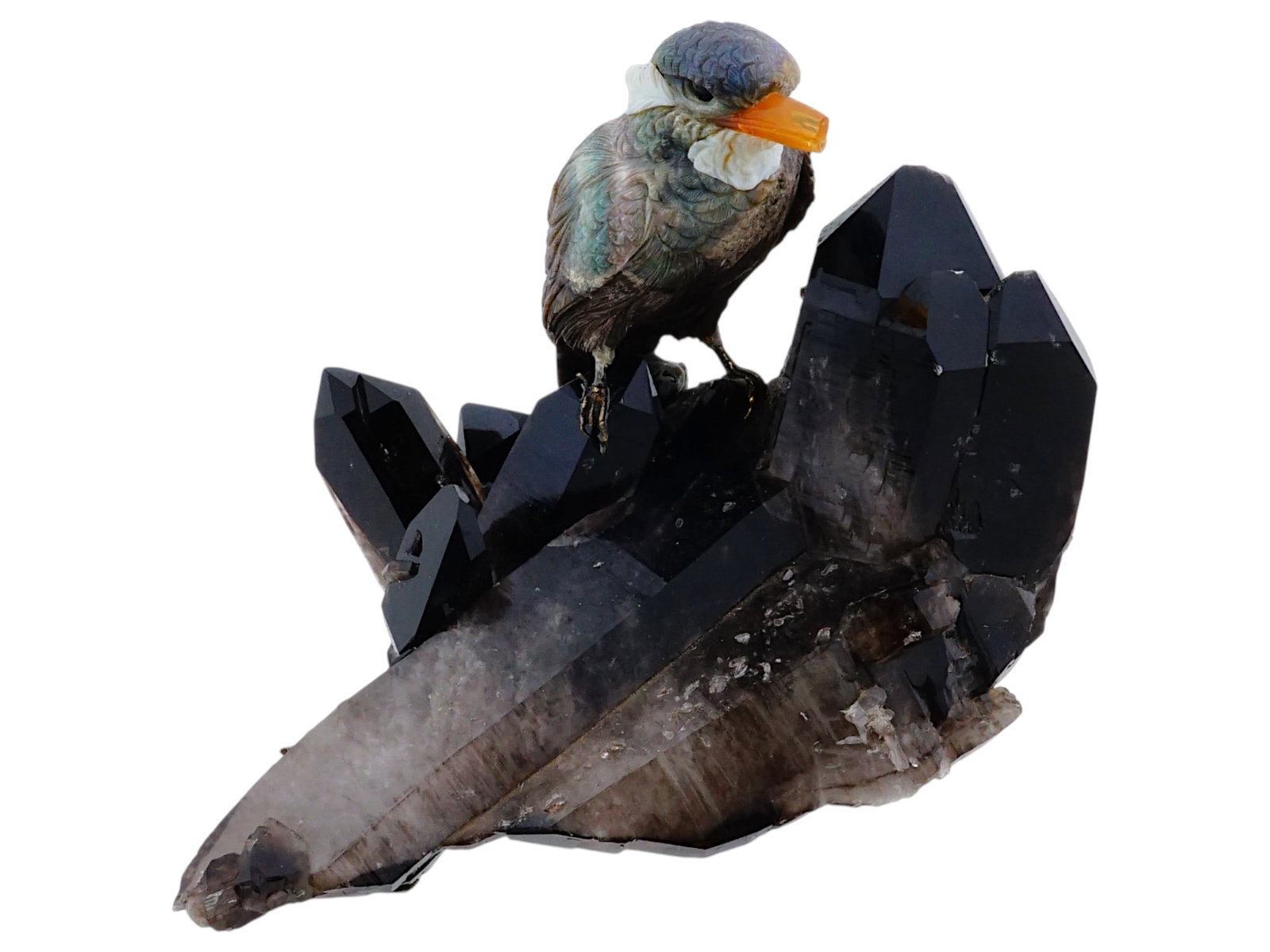 AMMOLITE CARVED BIRD FIGURE ON SMOKEY QUARTZ BASE: A hand carved Ammolite stone figure. The figure depicts a bird, engraved with detailed patterns. Mounted on a smokey Quartz base. Vintage and Modernist Carved Natural Stone Figures, Figurines, Statues