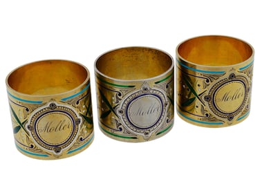 ANTIQUE GILT SILVER AND ENAMEL NAPKIN RINGS SET