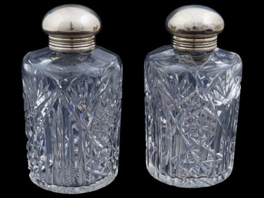 PAIR OF CRYSTAL GLASS AND SILVER BOTTLES