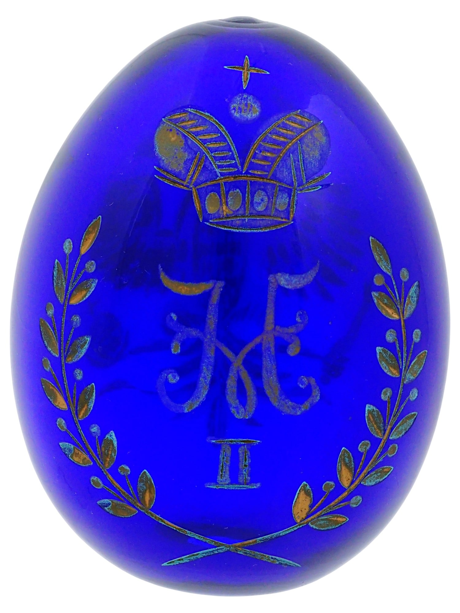 RUSSIAN IMPERIAL GILT ETCHED COBALT GLASS EASTER EGG: A Russian Imperial cobalt blue glass egg with a gilt etched Imperial monogram of Tsar Nicholas II of Russia. It also features a gilt etched motif, depicting the Russian double-headed eagle on the othe
