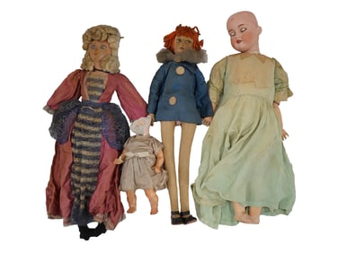 GROUP OF FOUR ANTIQUE DOLLS PORCELAIN IN CLOTHING