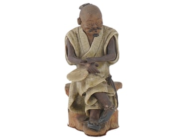 ASIAN CERAMIC FIGURINE OF ELDERLY MAN