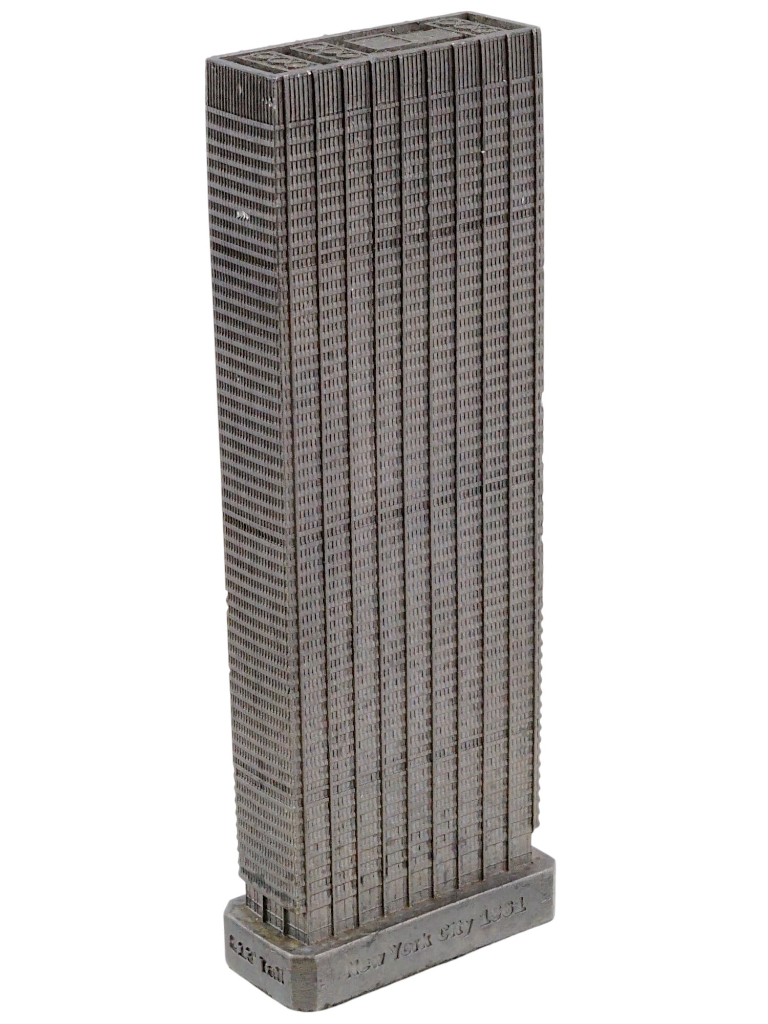 MINIATURE CAST METAL CHASE MANHATTAN PLAZA SCULPTURE: A miniature cast metal sculpture representing Chase Manhattan Plaza located between Pine, Liberty, and Nassau Streets in the Financial district of Manhattan and was completed in 1961. Titled on the ba