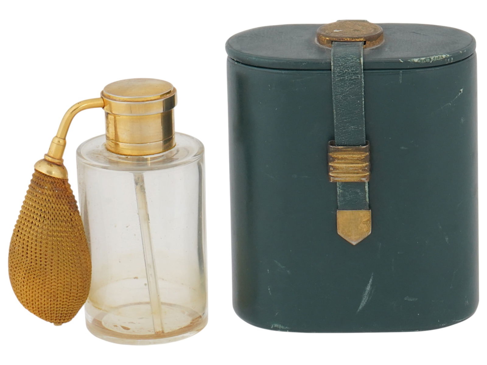 VINTAGE GUERLAIN PERFUME BOTTLE AND LEATHER CASE: A vintage perfume bottle with atomizer by Guerlain, a French luxury cosmetics and perfume brand. The piece comes with original branded leather case. Collectible Vanity Items, Beauty And Decor.