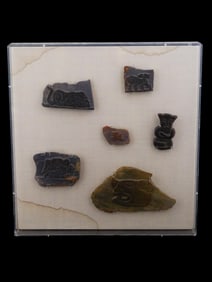 ANCIENT MANNER HAND CARVED STONE WARES IN SHADOW BOX