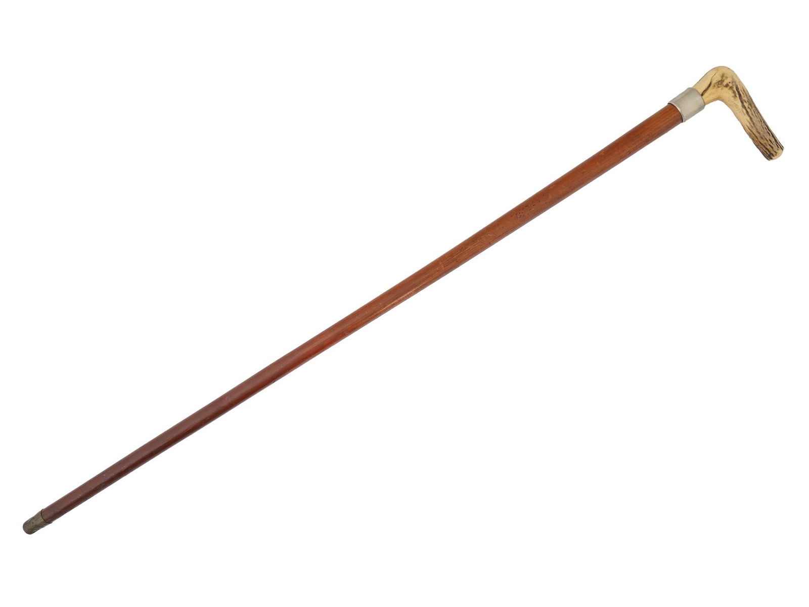 ANTIQUE GENTLEMANS WALKING CANE WITH CARVED ANTLER GRIP: An antique gentlemans walking cane, featuring a finely carved antler grip. The cane showcases traditional craftsmanship, with the natural textures of the antler complementing the elegant simplicity of