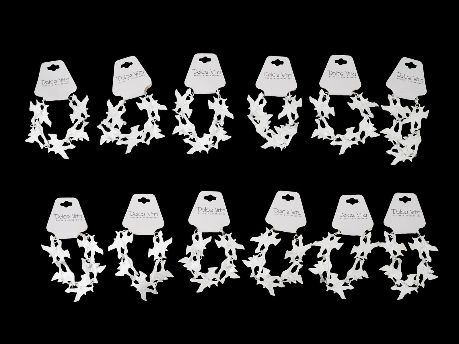 LOT OF FRENCH DOLCE VITA COSTUME JEWELRY BRACELETS: A collection of twelve French Dolce Vita Paris costume jewelry bracelets. Each bracelet is made in a chain link design featuring figural bird links in the Georges Braque manner. Each is marked with an