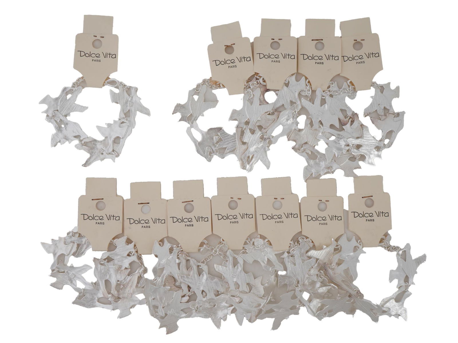 FRENCH DOLCE VITA PARIS COSTUME JEWELRY BRACELETS: A collection of twelve French Dolce Vita Paris costume jewelry bracelets. Each bracelet is made in a chain link design featuring figural bird links in the Georges Braque manner. Each is marked with an