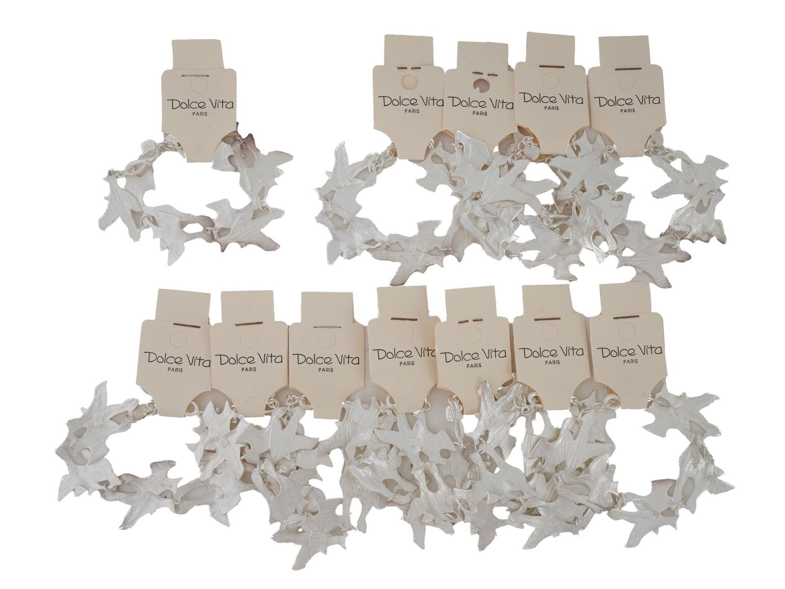 FRENCH DOLCE VITA PARIS COSTUME JEWELRY BRACELETS: A collection of twelve French Dolce Vita Paris costume jewelry bracelets. Each bracelet is made in a chain link design featuring figural bird links in the Georges Braque manner. Each is marked with an