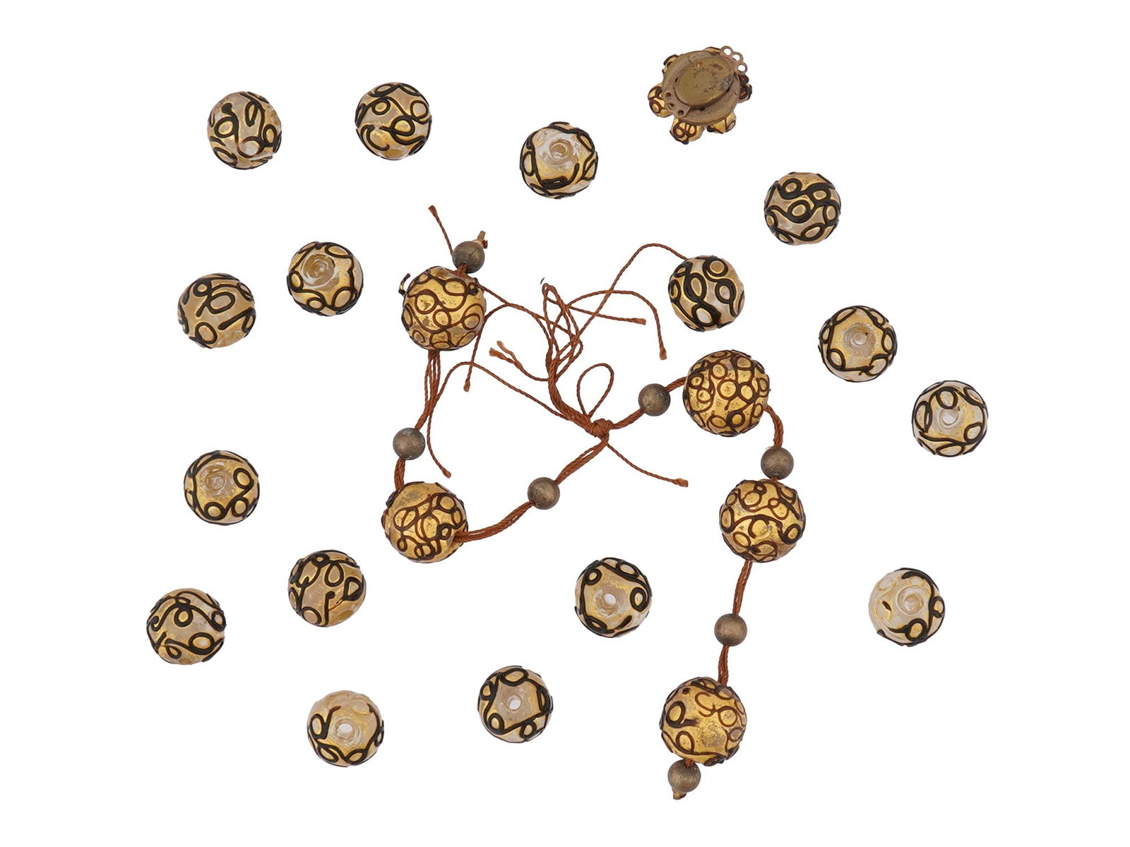 ITALIAN HAND PAINTED GLASS BEADS STRING W CLASP: An Italian string with a collection of assorted glass beads. The beads are decorated with a scrollwork motif. Completed with a clasp, marked, Made in Italy, on the backside. Vintage Statement Jewelry 