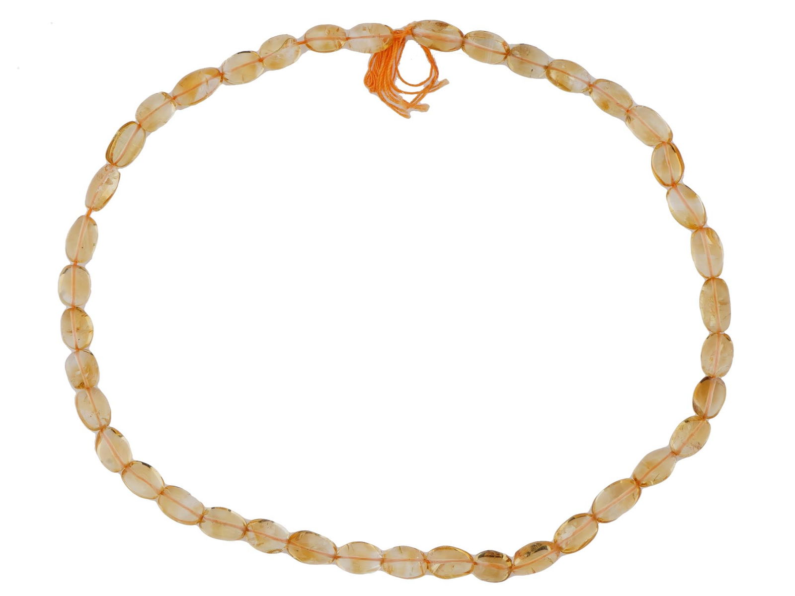 SET OF CITRINE STONE BEADS OF OVAL SHAPE FOR NECKLACE: A set of citrine stone beads in an elegant oval shape, perfect for crafting into a necklace. The beads display the warm, golden-yellow hues characteristic of citrine, with each bead shaped to enhance