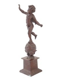 ANTIQUE PATINATED BRONZE SCULPTURE OF A CUPID
