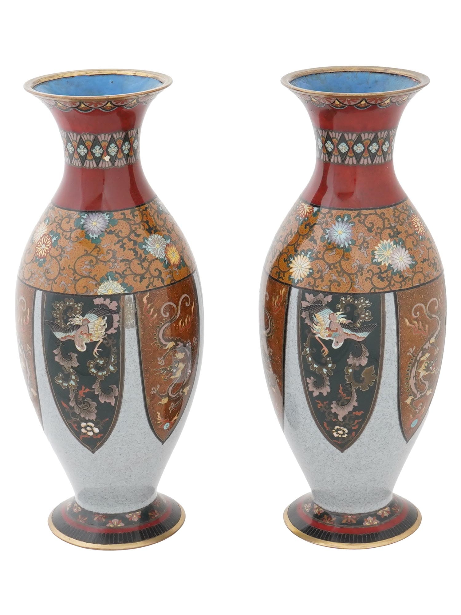 19TH C JAPANESE MEIJI PERIOD BALUSTER CLOISONNE VASES: A pair of antique Japanese Meiji period enamel vases. Each vase has a baluster shape and a fluted neck. The exteriors are adorned with polychrome enamel medallions with phoenix birds, dragons, floral