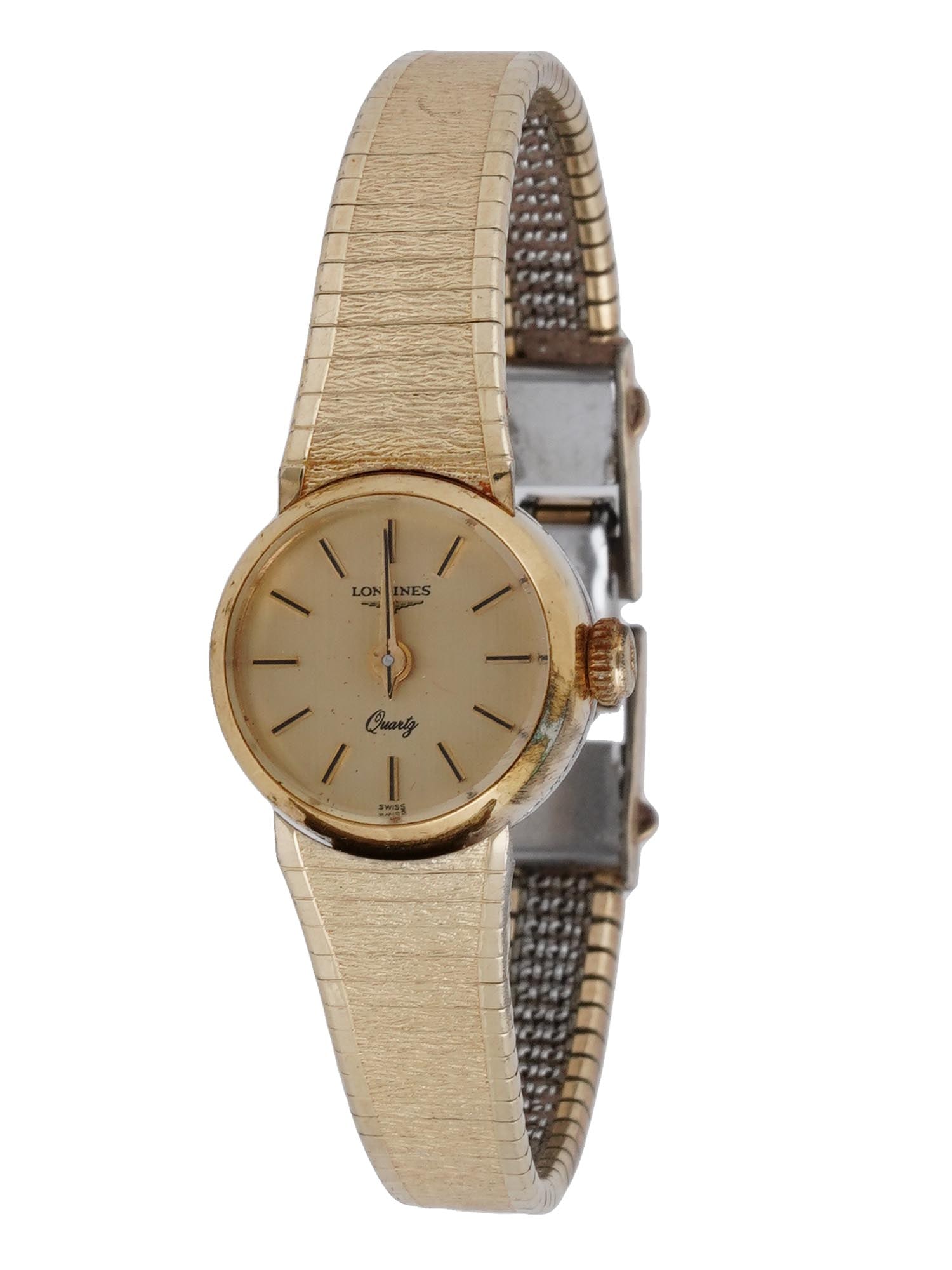 VINTAGE SWISS LONGINES LADIES 10K GOLD PLATED WATCH: A vintage Swiss Longines ladies quartz watch from the 1980s. Features a 10k gold-plated and stainless steel design. The 20mm case includes the original Longines-signed crown. It comes with a 10K rolle