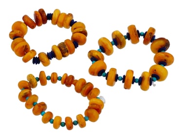 GROUP OF AMBER TURQUOISE AND LAPIS LAZULI BRACELETS
