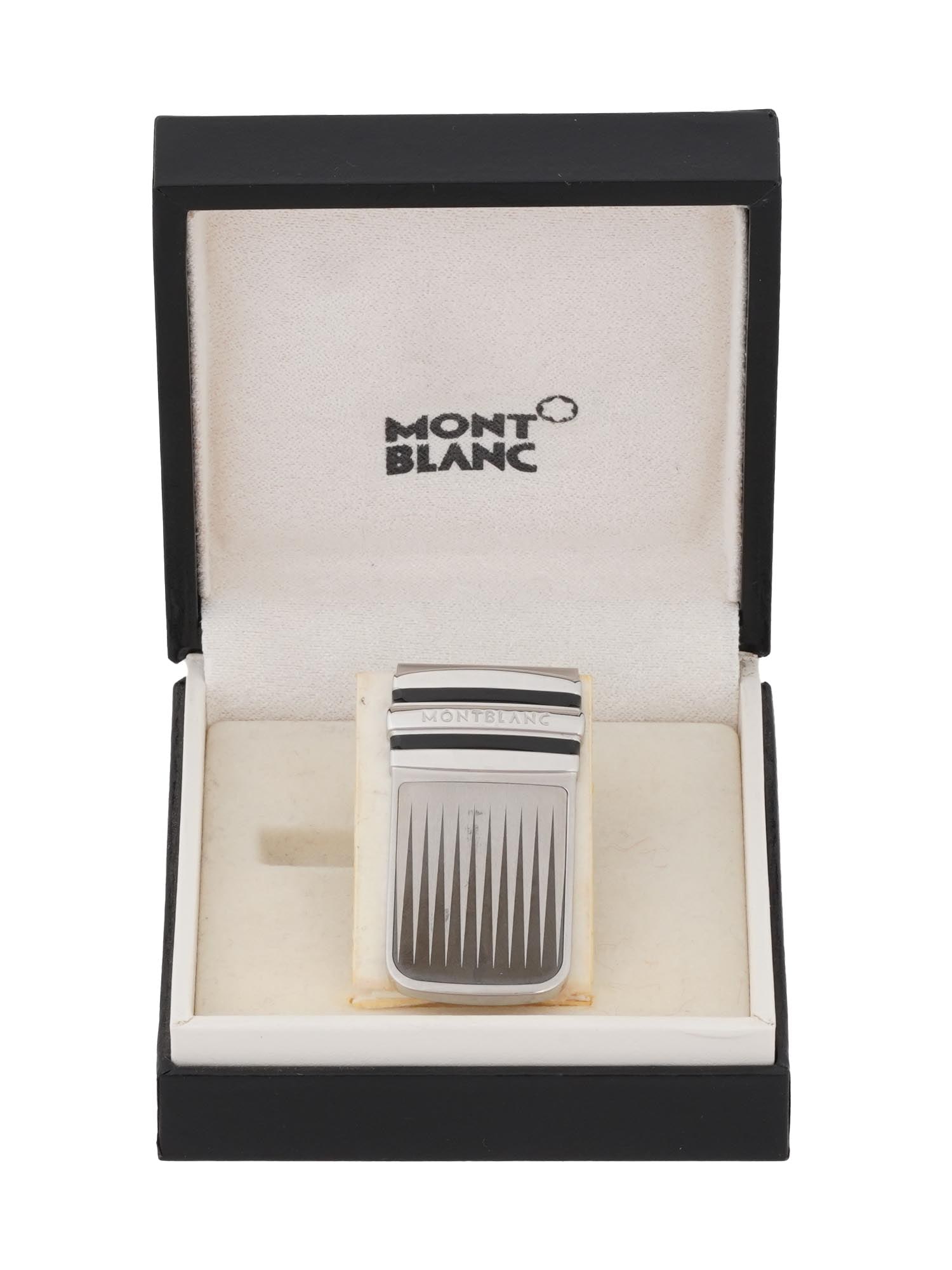 GERMAN MONTBLANC STEEL MONEY CLIP W BRANDED BOX: A German Montblanc steel money clip with the branded box. The item features a minimalist, clean design, featuring a geometric jagged pattern with Mont Blanc engraved above. The back is marked with the