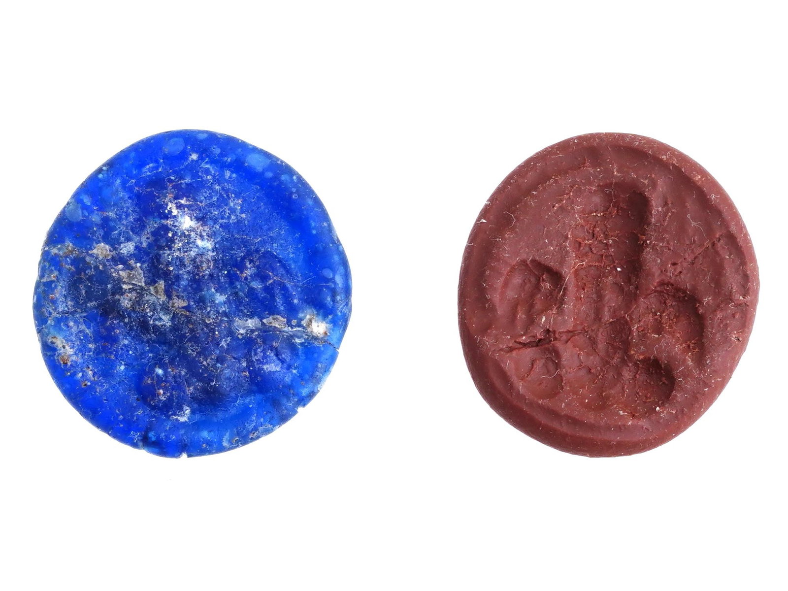 ANCIENT ROMAN GLASS MEDALLION WITH IMAGE OF WINGED PENIS: An ancient Roman round glass medallion featuring an engraved image of a winged penis, similar to images seen on the walls of Pompei. Circa 100 to 300 AD. Ancient Roman Rings And Pendants, Intaglios An