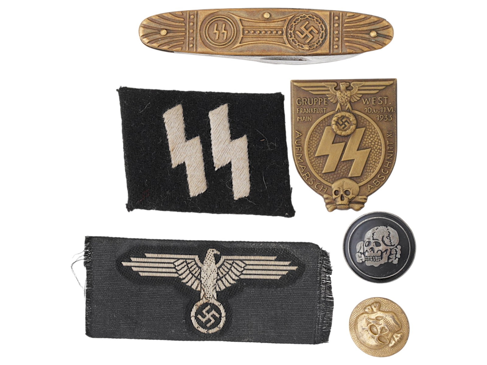 WWII NAZI GERMAN SS TOTENKOPF INSIGNIA: A lot of six WWII Nazi German insignia. Two SS Totenkopf pins. Reichsadler and SS patches. SS Gruppe West badge. Pocket knife with swastika and SS emblems. Collectible Pins And Badges, Second World Wa
