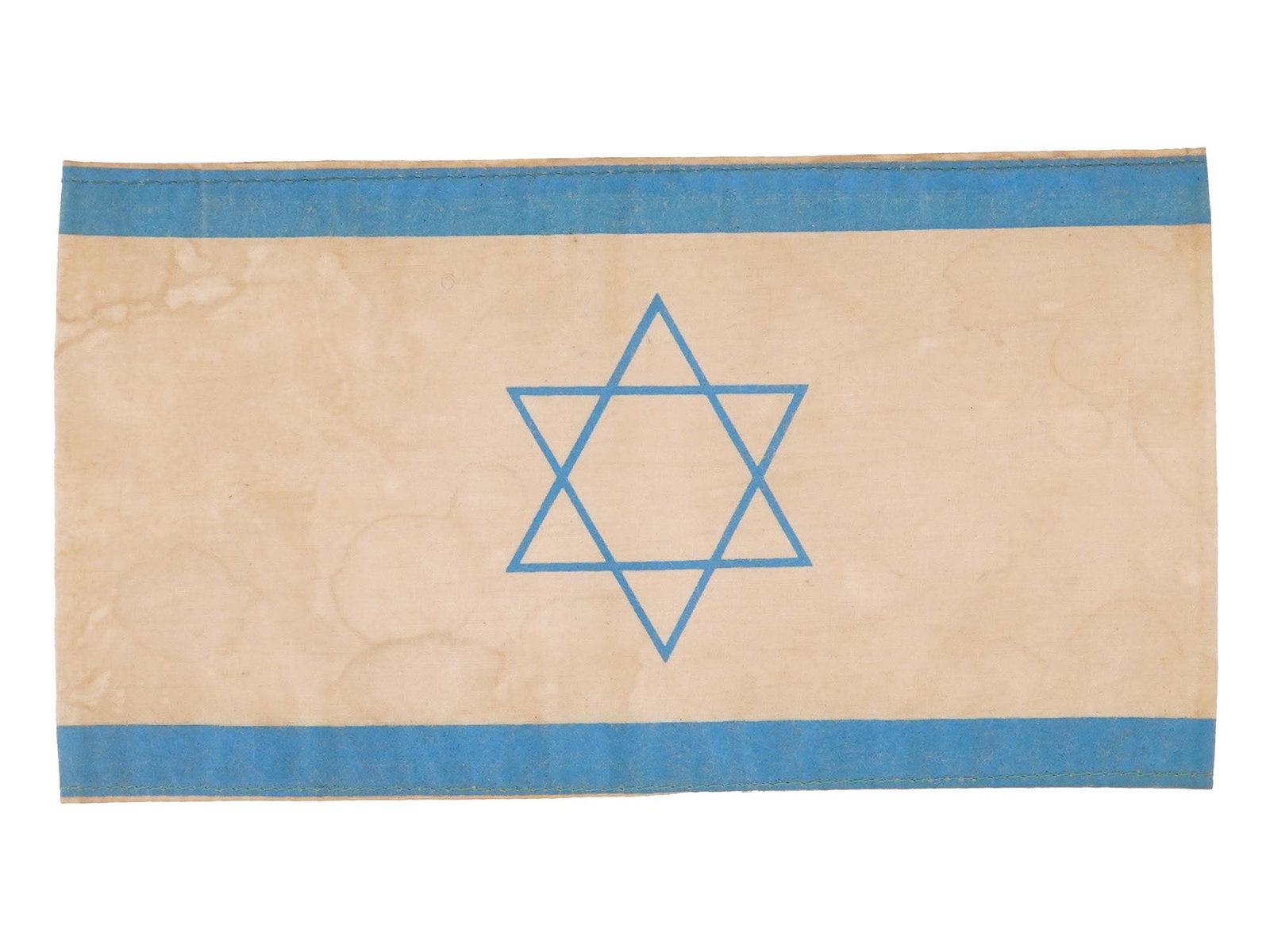 WWII STYLE NAZI HOLOCAUST STAR OF DAVID CLOTH ARMBAND: A World War II style cloth armband featuring a blue Star of David on the front and the marking KL Lager 1944 on the reverse. Such armbands were used by Nazi authorities to identify Jewish prisoners in