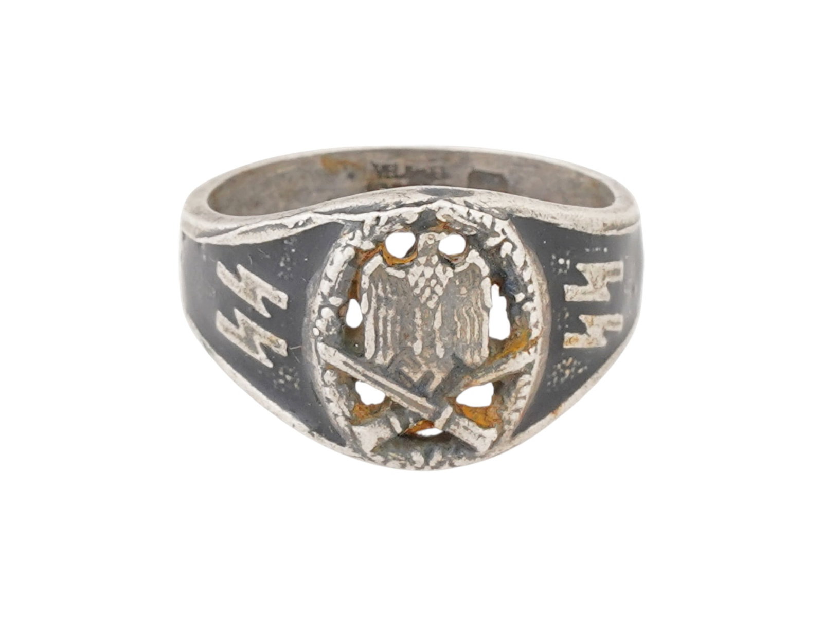 GERMAN WWII TYPE WAFFEN SS GENERAL ASSAULT SILVER RING: A WWII type Nazi German Waffen SS general assault silver ring. The ring is adorned with an engraved image of a Nazi eagle holding a swastika insignia and crossed swords below, SS runes on the sides, a