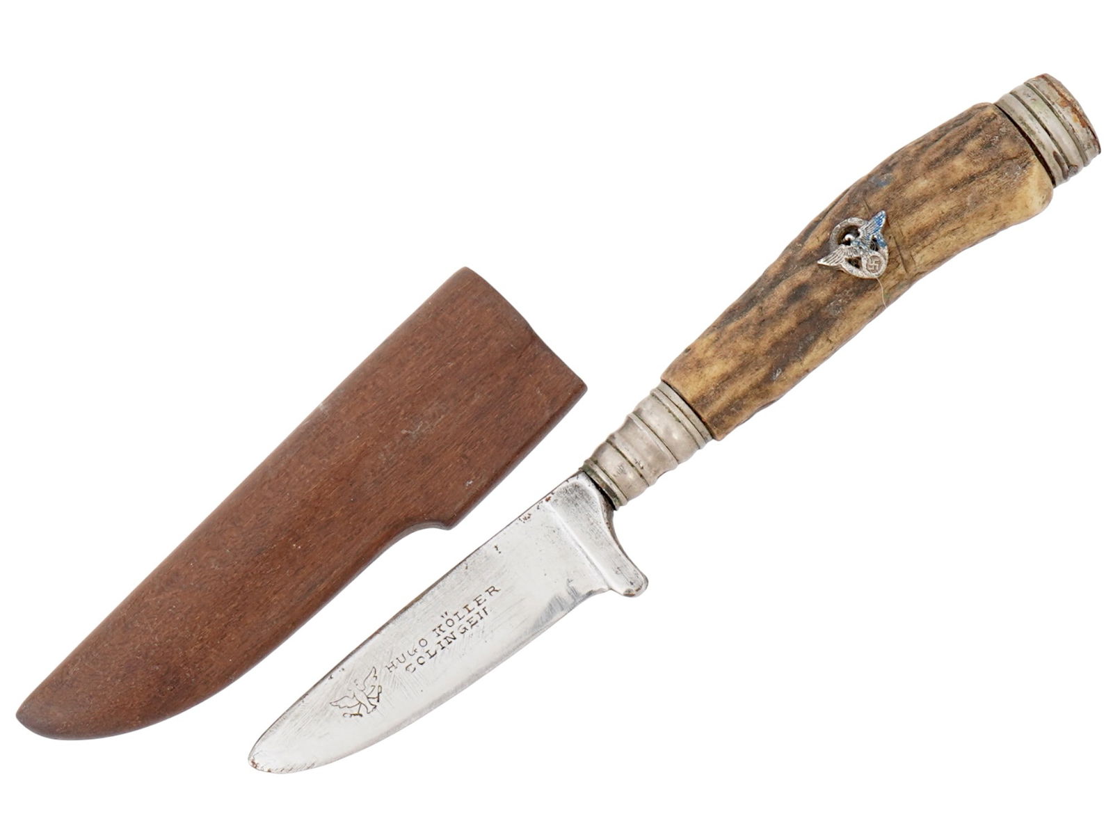 WWII TYPE GERMAN SS POLICE HUNTING KNIFE W SHEATH: A World War II type Nazi German hunting knife. The blade is marked Hugo Koller Solingen. The wooden handle is decorated with an overlay Reichsadler and swastika. The item come in a sheath. Second Worl