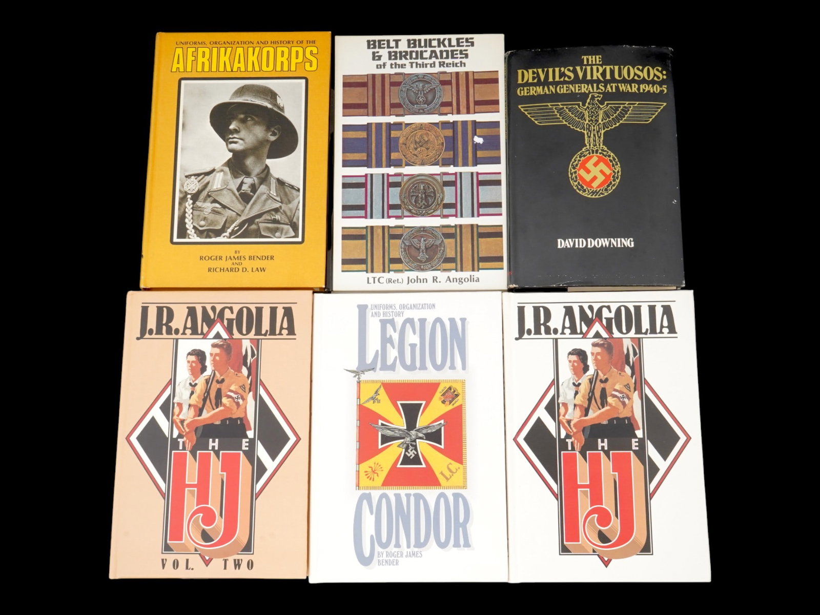 COLLECTION OF BOOKS ABOUT WWII AND GERMAN MILITARY: A lot of six vintage books dedicated to Nazi Germany and World War II. Uniforms, Organization and History of the Afrikakorps by Roger James Bender and Richard D. Law, 1973. Belt Buckles and Brocades o