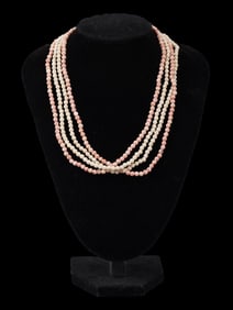 PAIR OF VINTAGE CARVED CORAL BEADED DESIGN NECKLACES