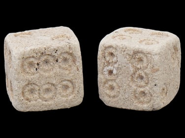 PAIR OF ANCIENT ROMAN GAMING DICE CARVED FROM STONE