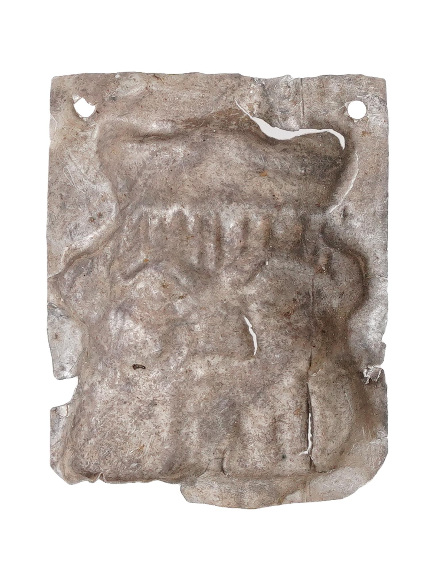 ANCIENT EGYPTIAN SILVER PLAQUE OF GOD BES PORTRAIT: An ancient Egyptian Late Period Silver plaque. The plaque represents a relief portrait of Bes, an ancient Egyptian deity, worshipped as a protector of households and, in particular, of mothers, childr