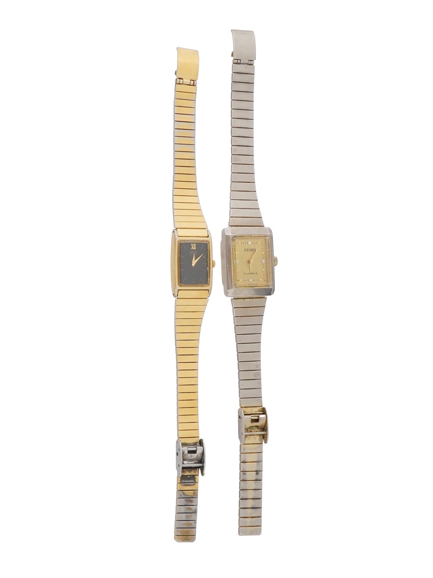 VINTAGE SEIKO WOMENS WRISTWATCHES OF CLASSICAL DESIGN: A pair of vintage Seiko womens wristwatches. The first features a gold-tone case with a black dial, while the second boasts a mechanical movement with 17 jewels. Both offer classic style and reliable