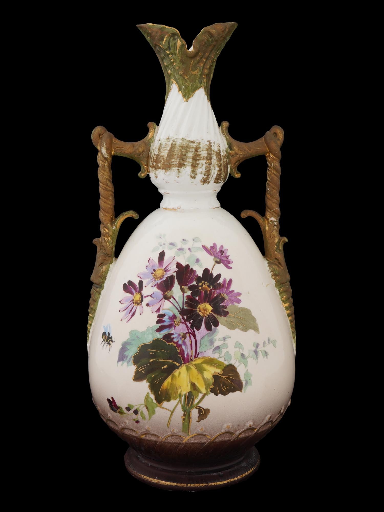 ANTIQUE AUSTRIAN ERNST WAHLISS ART NOUVEAU PAINTED VASE: An antique Austrian Art Nouveau hand-painted vase by Ernst Wahliss factory. The vase features a white ovoid shaped body adorned with a floral design, including purple and yellow flowers with green lea