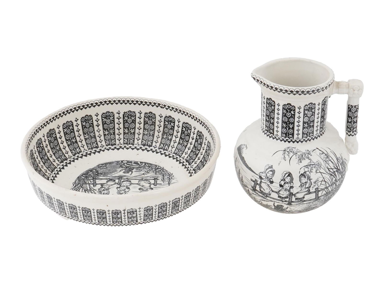 TRANSFERWARE PITCHER AND BOWL SET AFTER KATE GREENAWAY: A vintage transferware pitcher and bowl set after Kate Greenaway. The design was first designed by Kate Greenway using transferware technique around the 1880s. The classic shaped pitcher with a round